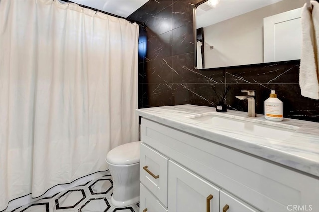 32152 Via Carlos, San Juan Capistrano, CA 92675 - full bathroom featuring vanity, backsplash, and a shower with shower curtain