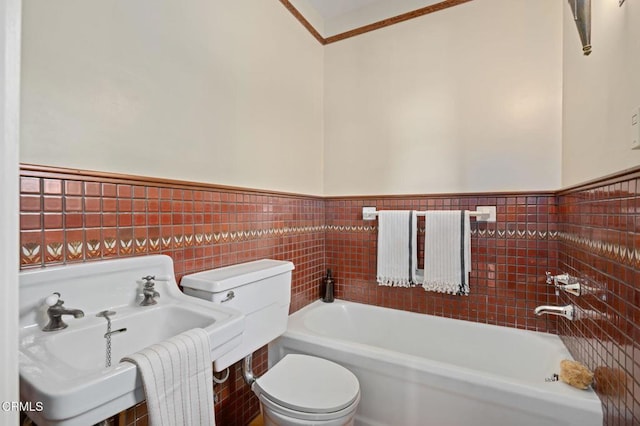 402 Lynn Dr, Ventura, CA 93003 - full bath with a bath, tile walls, toilet, and wainscoting
