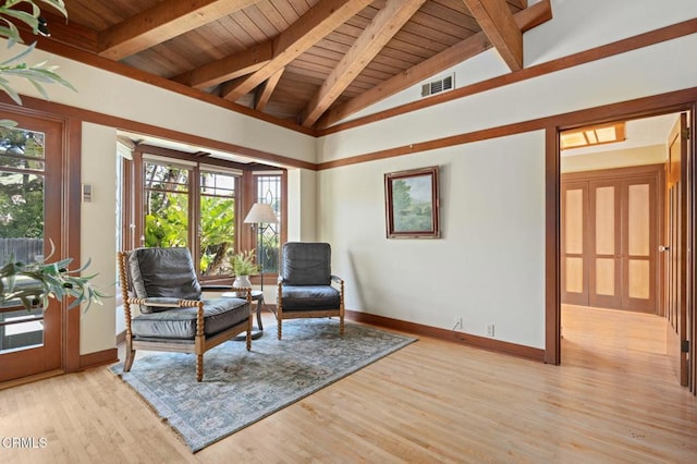 402 Lynn Dr, Ventura, CA 93003 - living area with baseboards, light wood-style floors, visible vents, wood ceiling, and vaulted ceiling with beams