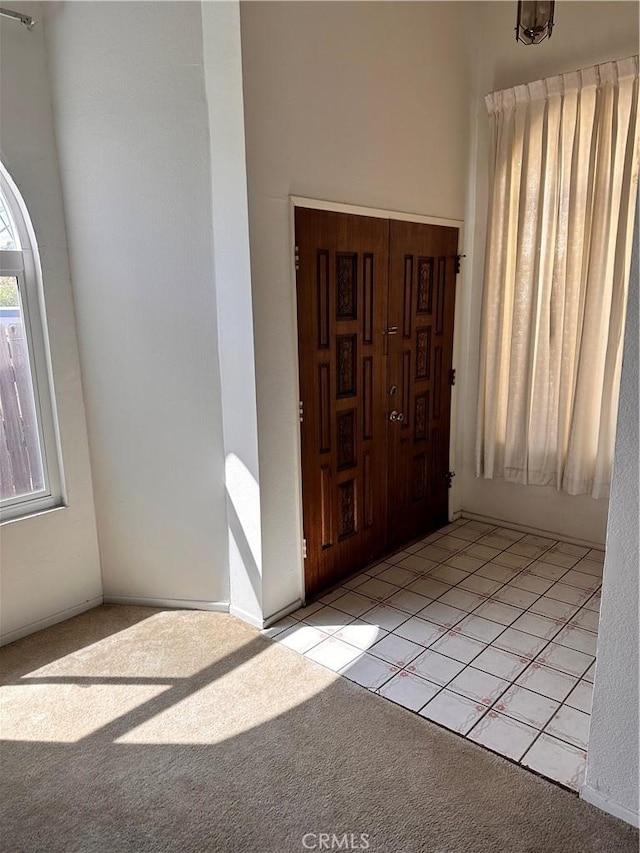 2231 Cedar St Unit G, Alhambra, CA 91801 - entryway featuring light colored carpet and light tile patterned floors