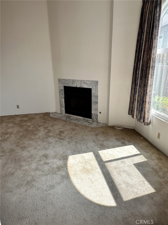 2231 Cedar St Unit G, Alhambra, CA 91801 - unfurnished living room featuring carpet and a high end fireplace