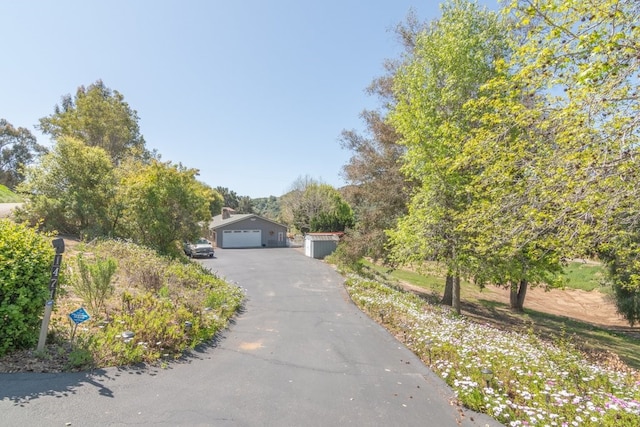 1471 Via Monserate, Fallbrook, CA 92028 - view of property hidden behind natural elements with a detached garage