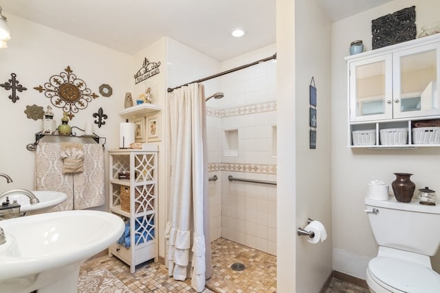 1471 Via Monserate, Fallbrook, CA 92028 - full bathroom with a tile shower, toilet, and baseboards