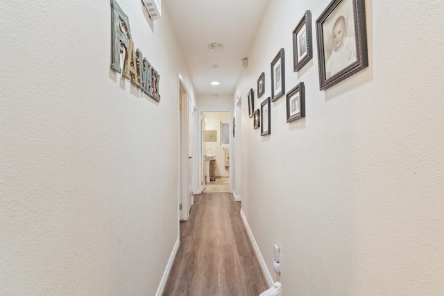 1471 Via Monserate, Fallbrook, CA 92028 - corridor with recessed lighting, dark wood-style floors, and baseboards