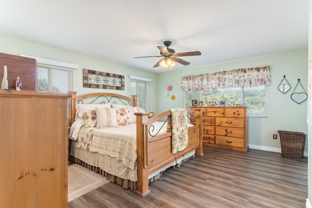 1471 Via Monserate, Fallbrook, CA 92028 - bedroom featuring multiple windows, wood finished floors, and baseboards