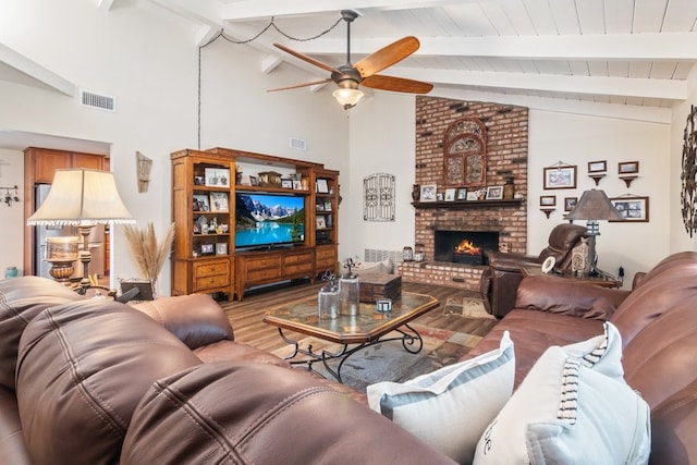1471 Via Monserate, Fallbrook, CA 92028 - living room with wood finished floors, ceiling fan, a brick fireplace, high vaulted ceiling, and wooden ceiling with exposed beams