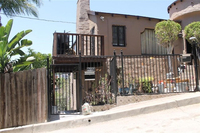 2859 Effie St, Los Angeles, CA 90026 - view of front of home with stucco siding and a gate