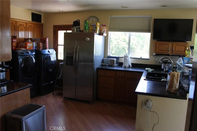 2859 Effie St, Los Angeles, CA 90026 - kitchen with washer and dryer, stainless steel fridge, a sink, wood finished floors, and dark countertops