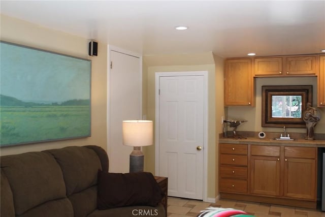 2859 Effie St, Los Angeles, CA 90026 - kitchen with recessed lighting, open floor plan, and brown cabinetry