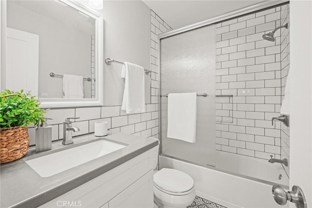 15 15th St Unit 6, Hermosa Beach, CA 90254 - full bathroom featuring toilet, combined bath / shower with glass door, vanity, and decorative backsplash