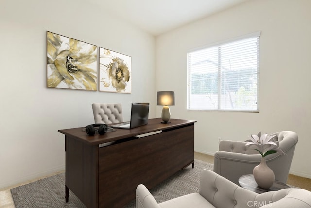 office area with light carpet and baseboards