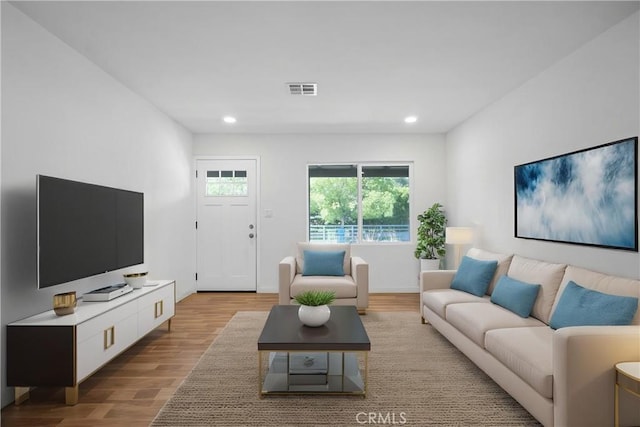 14320 Osborne St, Panorama City, CA 91402 - living room with light wood-style flooring, recessed lighting, and baseboards