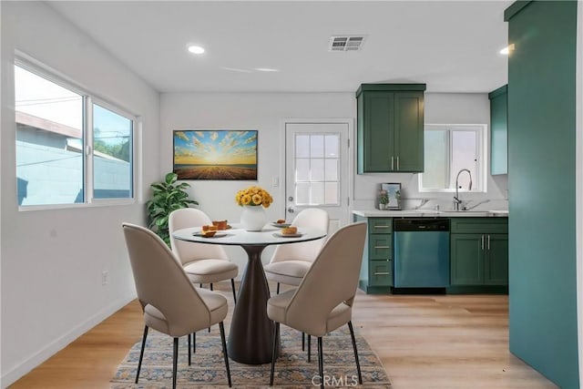 14320 Osborne St, Panorama City, CA 91402 - dining area featuring plenty of natural light, light wood finished floors, recessed lighting, and baseboards