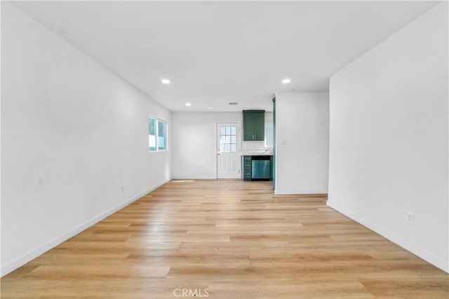 14320 Osborne St, Panorama City, CA 91402 - spare room with light wood-type flooring, recessed lighting, and baseboards