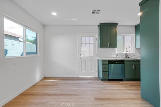 14320 Osborne St, Panorama City, CA 91402 - kitchen with green cabinets, dishwasher, light countertops, healthy amount of natural light, and recessed lighting