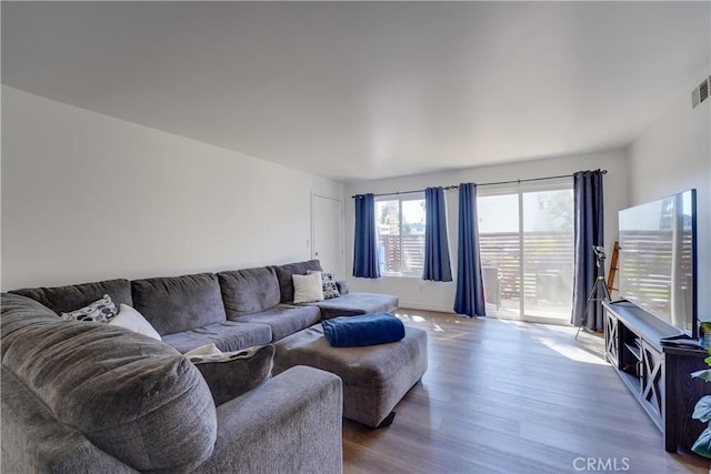 1386 E Madison Ave Unit 21, El Cajon, CA 92021 - living room featuring wood finished floors and visible vents
