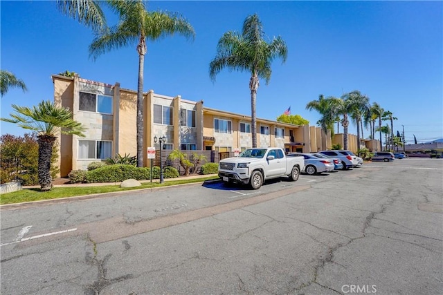 1386 E Madison Ave Unit 21, El Cajon, CA 92021 - view of building exterior featuring uncovered parking