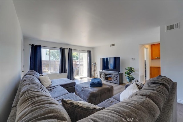 1386 E Madison Ave Unit 21, El Cajon, CA 92021 - living room with visible vents and wood finished floors