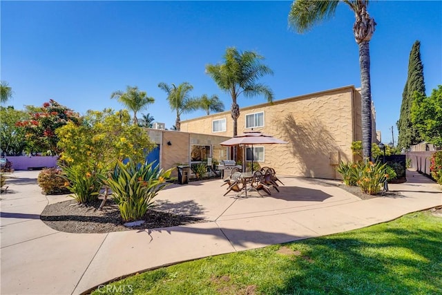 1386 E Madison Ave Unit 21, El Cajon, CA 92021 - back of house with a patio area and stucco siding