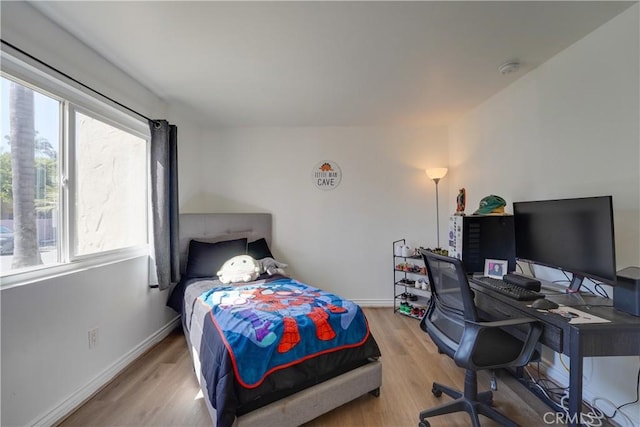 1386 E Madison Ave Unit 21, El Cajon, CA 92021 - bedroom with baseboards and wood finished floors
