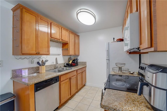 1386 E Madison Ave Unit 21, El Cajon, CA 92021 - kitchen featuring a sink, light countertops, light tile patterned flooring, and stainless steel appliances