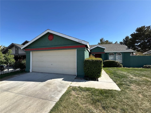 ranch-style house with stucco siding, a front lawn, and concrete driveway