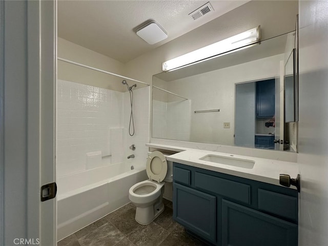 full bath with bathing tub / shower combination, visible vents, vanity, and toilet
