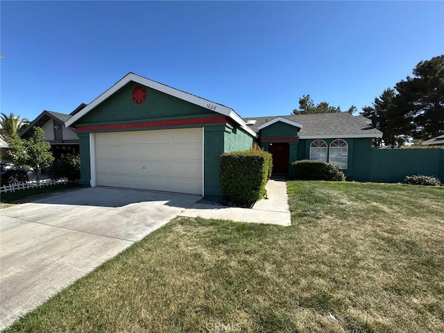 single story home with driveway, a garage, and a front yard