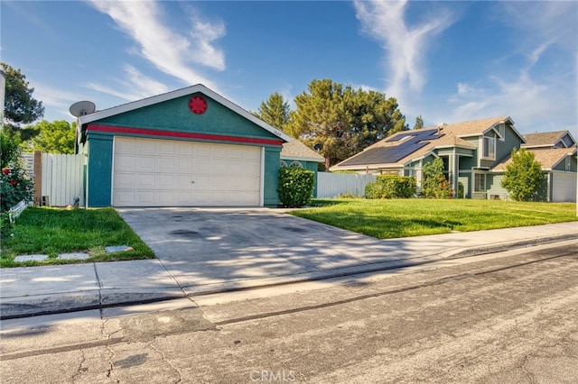 1628 Bluebell St, Lancaster, CA 93535 - view of front of property with a garage, stucco siding, and concrete driveway