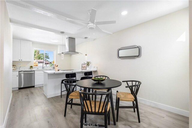 1000 W Macarthur Blvd Unit 106, Santa Ana, CA 92707 - dining area featuring light wood-style floors, baseboards, a ceiling fan, and recessed lighting