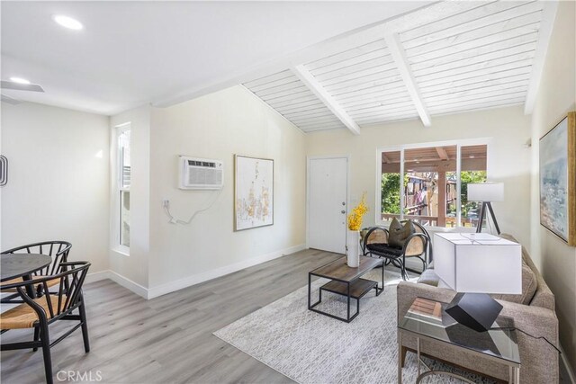 1000 W Macarthur Blvd Unit 106, Santa Ana, CA 92707 - living room featuring a wall unit AC, light wood-type flooring, baseboards, and recessed lighting
