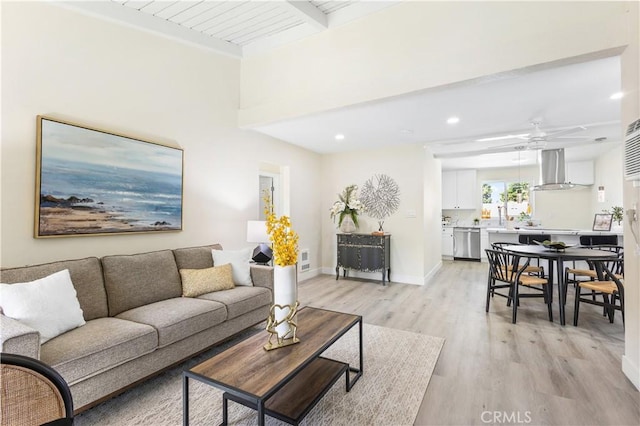 1000 W Macarthur Blvd Unit 106, Santa Ana, CA 92707 - living room featuring light wood finished floors, ceiling fan, beamed ceiling, recessed lighting, and baseboards