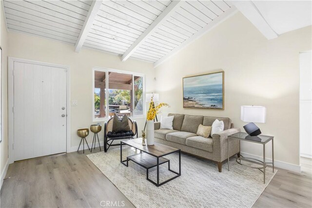 1000 W Macarthur Blvd Unit 106, Santa Ana, CA 92707 - living room with wood finished floors, baseboards, and wood ceiling