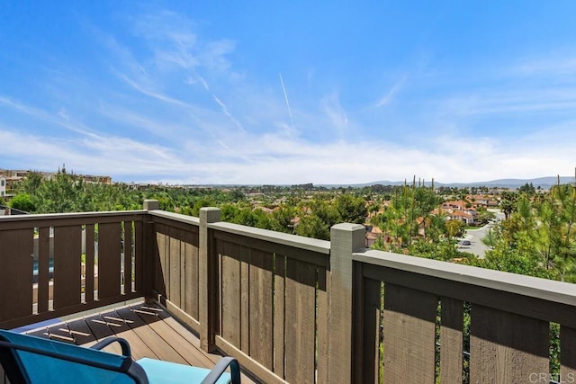 wooden deck featuring a mountain view
