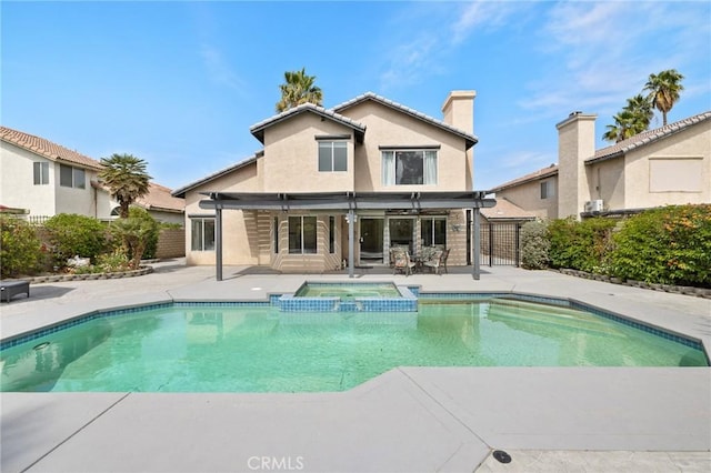 78675 Bradford Cir, La Quinta, CA 92253 - view of pool with a patio, a pool with connected hot tub, and fence
