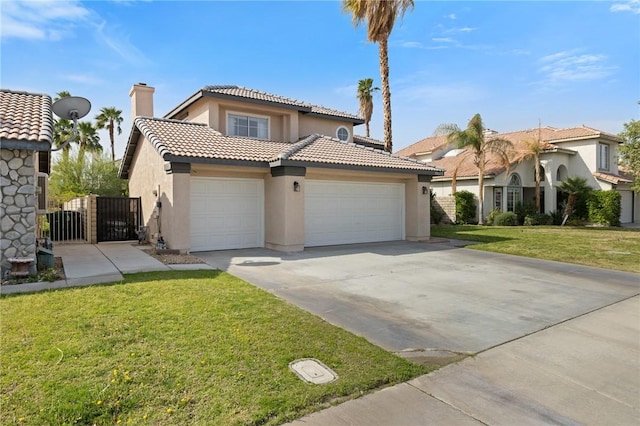 78675 Bradford Cir, La Quinta, CA 92253 - mediterranean / spanish-style house with a front yard, a tiled roof, an attached garage, stucco siding, and a gate
