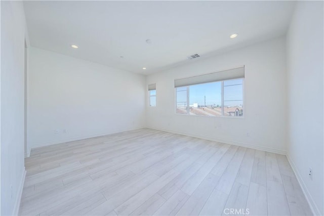 1245 Oliva Ct, Duarte, CA 91010 - unfurnished room with light wood-style flooring and recessed lighting