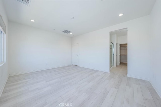 1245 Oliva Ct, Duarte, CA 91010 - unfurnished room featuring light wood-style floors and recessed lighting
