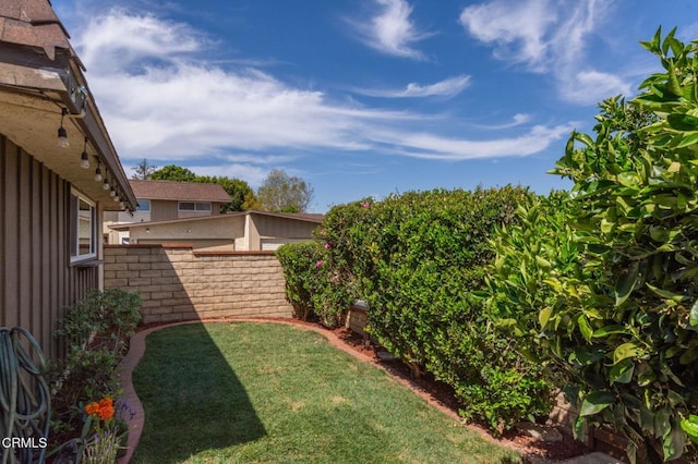 view of yard featuring fence