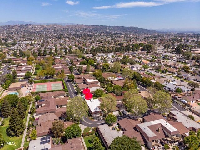 aerial view with a mountain view and a residential view