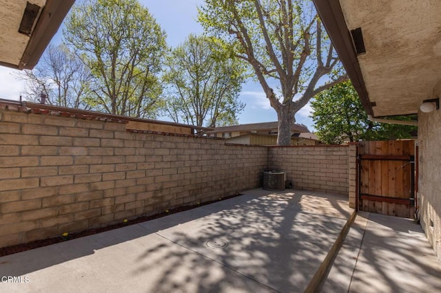 view of patio / terrace with a gate and fence