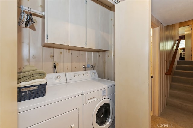 28018 Peninsula, Lake Arrowhead, CA 92352 - laundry room with washing machine and clothes dryer, cabinet space, and wooden walls