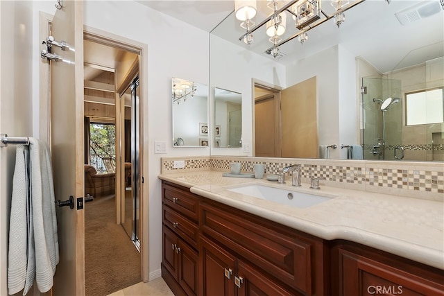 28018 Peninsula, Lake Arrowhead, CA 92352 - full bath featuring vanity, backsplash, a shower, and a chandelier