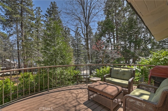 28018 Peninsula, Lake Arrowhead, CA 92352 - wooden deck with an outdoor hangout area