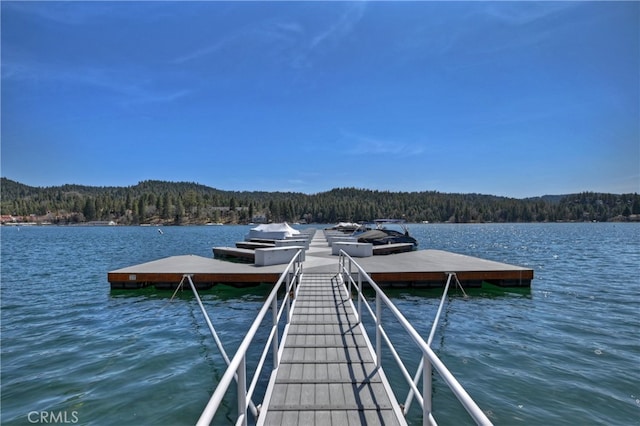 28018 Peninsula, Lake Arrowhead, CA 92352 - dock area featuring a forest view and a water view