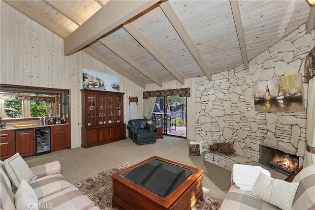 28018 Peninsula, Lake Arrowhead, CA 92352 - carpeted living room with beverage cooler, bar with sink, wooden ceiling, healthy amount of natural light, and wood walls