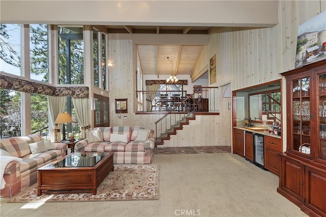 28018 Peninsula, Lake Arrowhead, CA 92352 - living room with beverage cooler, a chandelier, stairway, bar area, and carpet