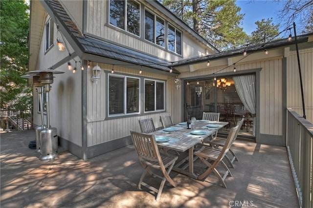 28018 Peninsula, Lake Arrowhead, CA 92352 - rear view of house featuring outdoor dining space and a patio area