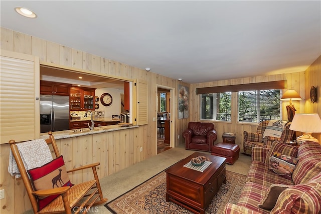28018 Peninsula, Lake Arrowhead, CA 92352 - carpeted living area with wooden walls and wet bar