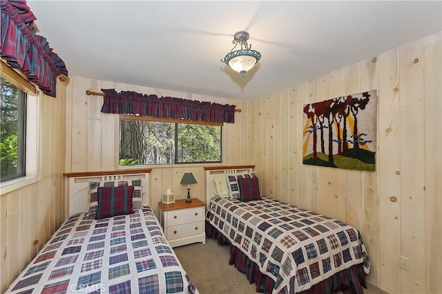 28018 Peninsula, Lake Arrowhead, CA 92352 - carpeted bedroom featuring multiple windows and wooden walls